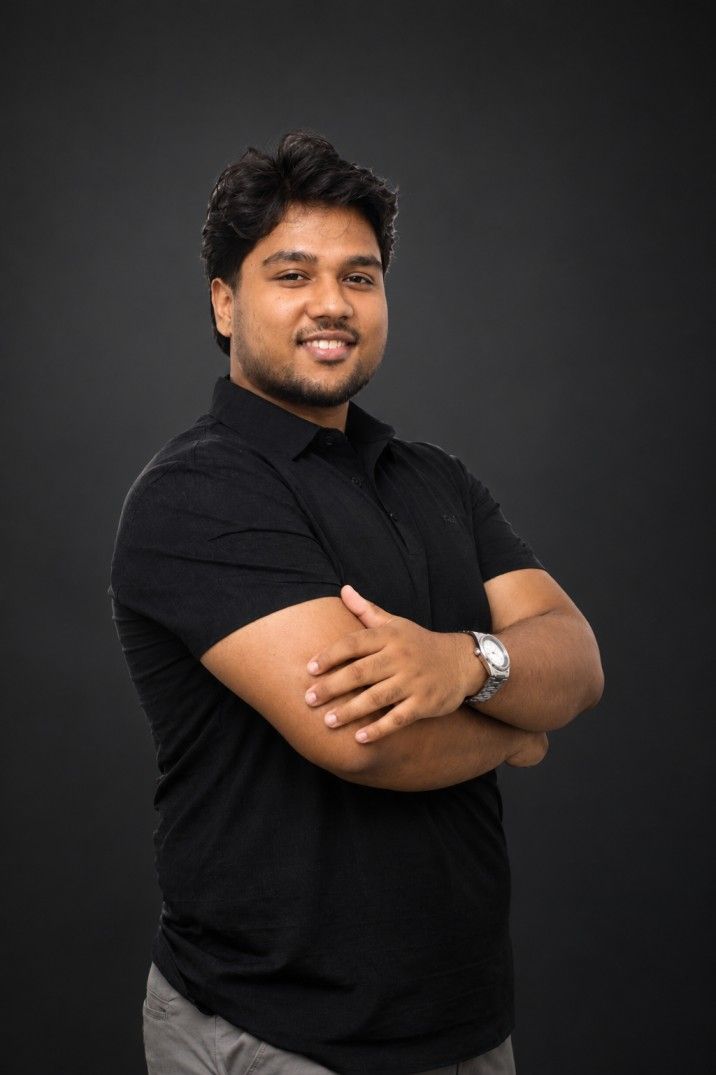 Aashish Khadka, founder of Basilpot, in a black polo shirt with arms crossed